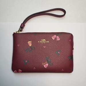 Coach Black Cherry Corner Zip Wristlet with Holiday Bells Print